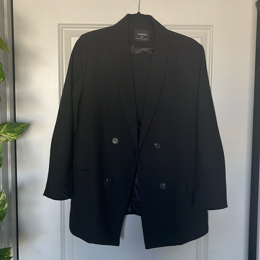 Black suit, jacket and mini skirt, size small, great condition.